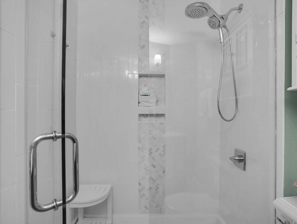 Primary bathroom with walk-in shower.