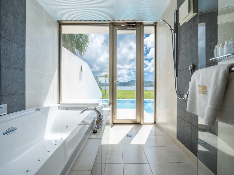 Executive Suite, 1 Bedroom, Non Smoking, Private Pool | Bathroom | Combined shower/tub, designer toiletries, hair dryer, bathrobes