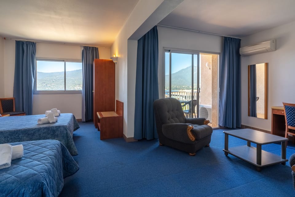 Quadruple Room, Sea View | Desk, rollaway beds, bed sheets