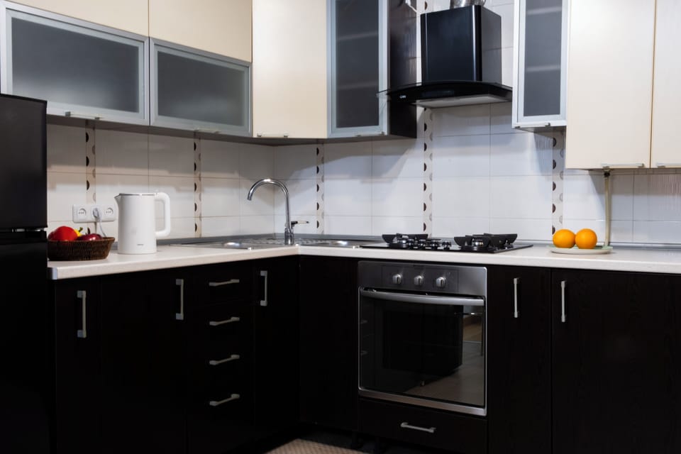 Deluxe Apartment, Balcony, City View | Private kitchen | Fridge, microwave, stovetop, electric kettle