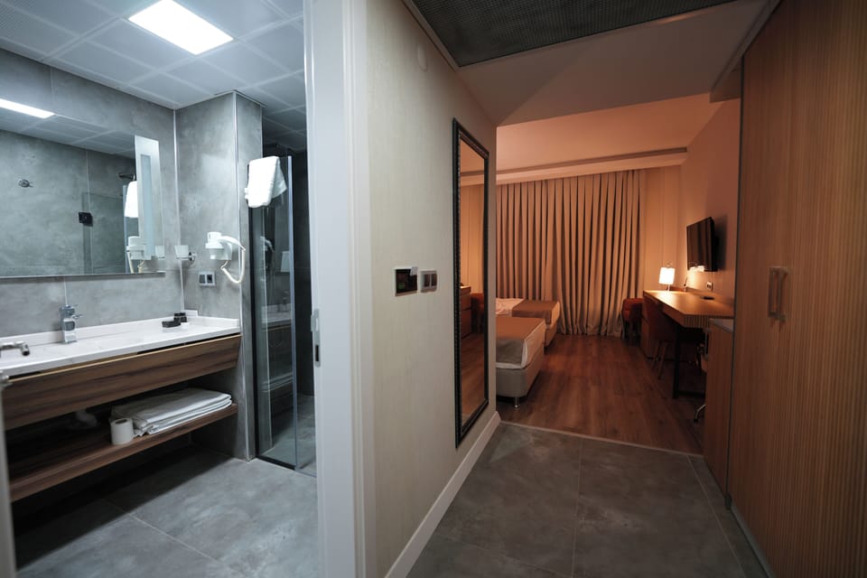 Standard Double or Twin Room, Garden View | Bathroom | Shower, hair dryer, towels, soap