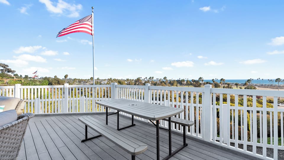 Table on the back patio viewing the ocean & islands