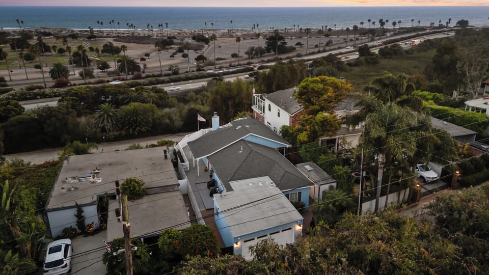 Aerial view of the home showing the beautiful ocean