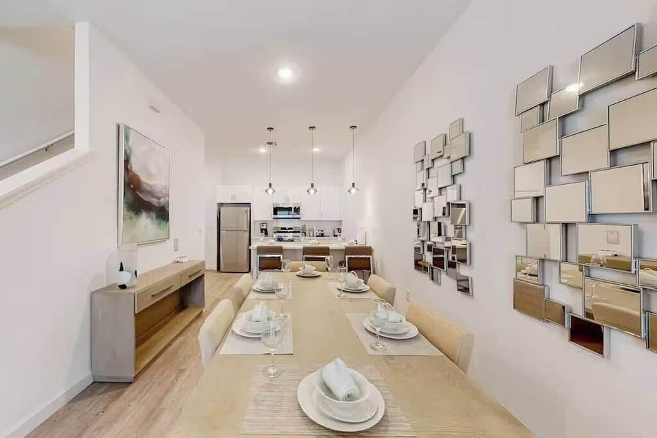 Gather around the dining table with seating for everyone, ideal for shared meals and great conversations.