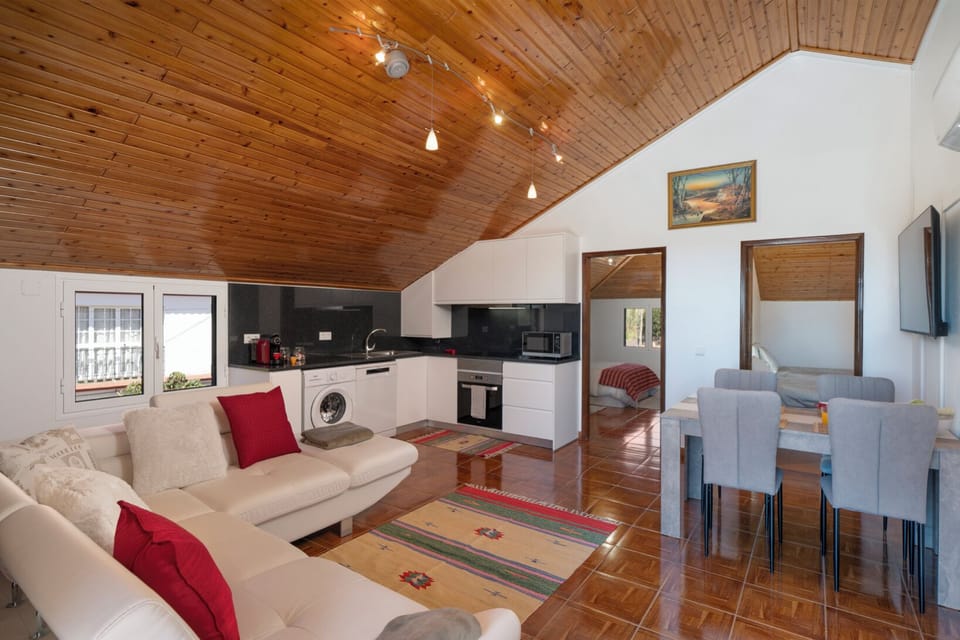 The Spacious Living Area Of Prazeres Pradise Apartment By Ourmadeira