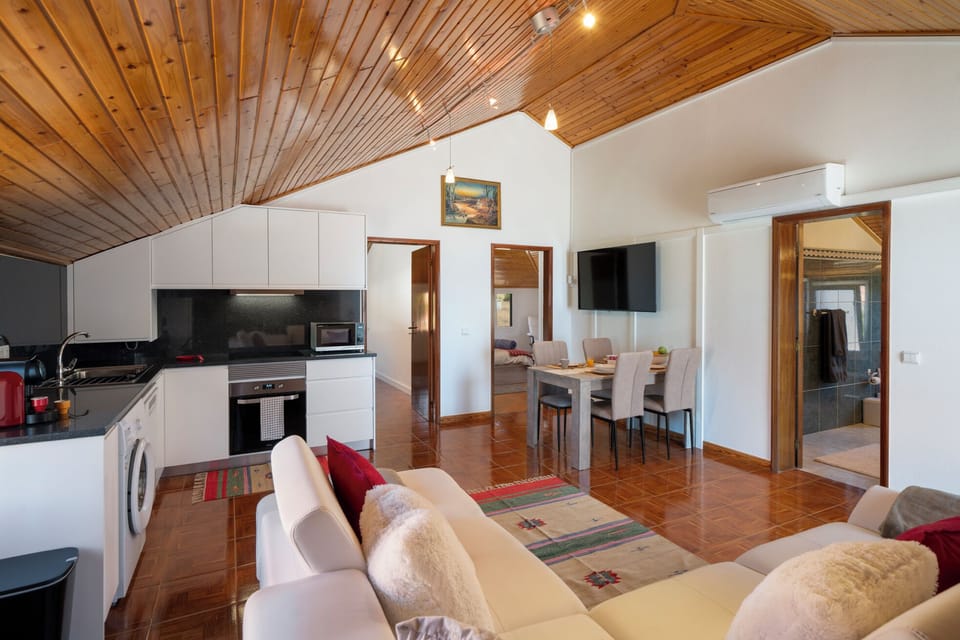 The Living Area Of Prazeres Paradise Apartment By Ourtmadeira Showing The Lcation Of The Bedroom And The Bathroom