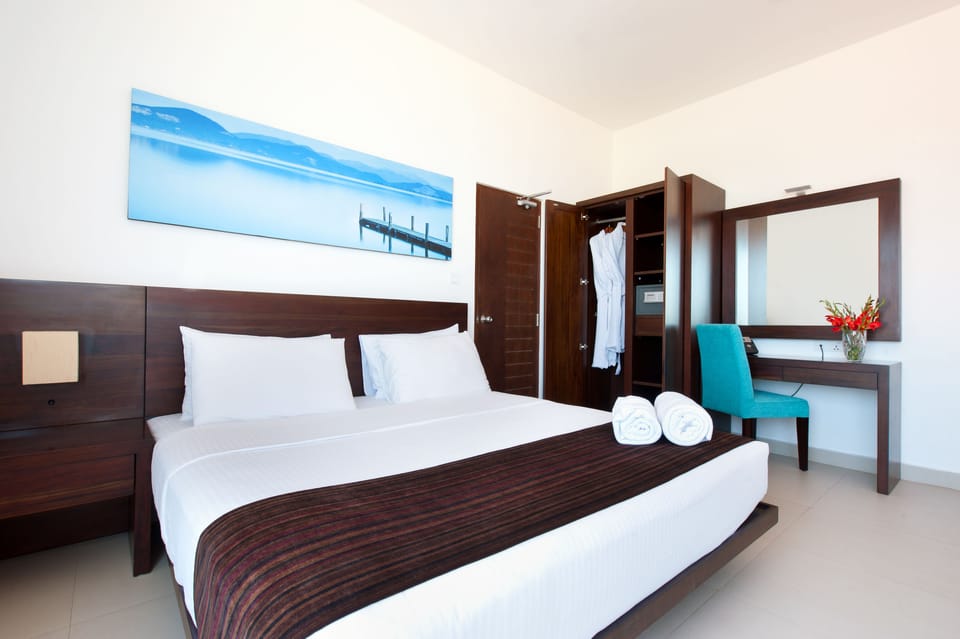 Premium bedding, in-room safe, desk, iron/ironing board (on request)
