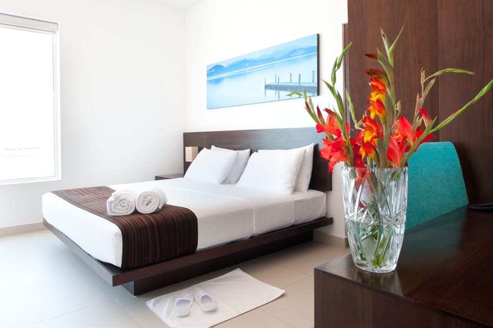 Premium bedding, in-room safe, desk, iron/ironing board (on request)
