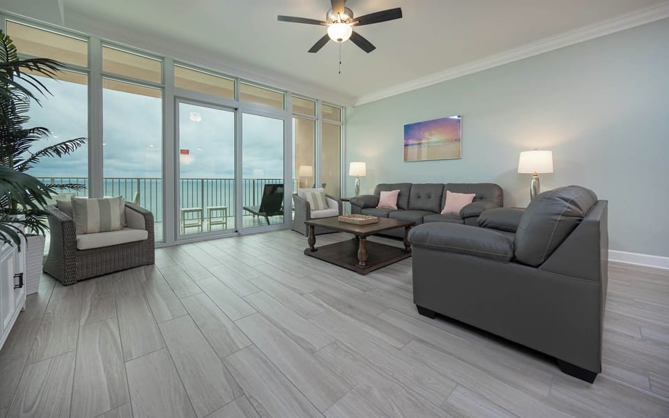 Sink into the plush sofa, then step onto the balcony to listen to gulf waves and view the beachfront