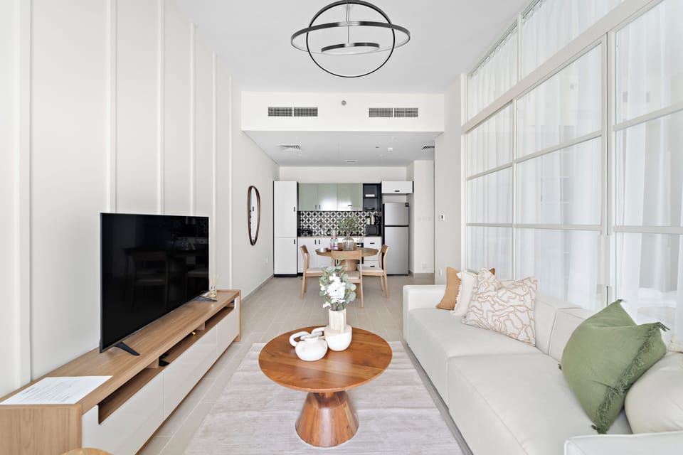Premier Apartment | Living area | 50-inch Smart TV with digital channels