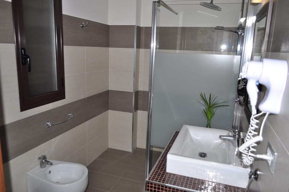 Standard Double or Twin Room, Accessible | Bathroom | Free toiletries, hair dryer, bidet, towels