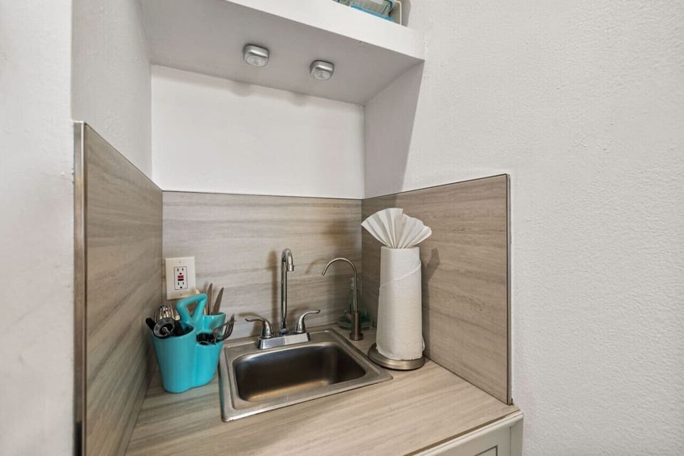Clean walk-in shower w/ tile surround for a fresh, comfortable refresh.