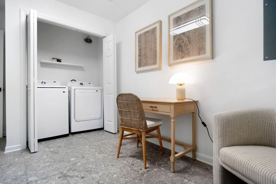 Small desk nook w/ natural light, ideal for emails or quiet focus time.