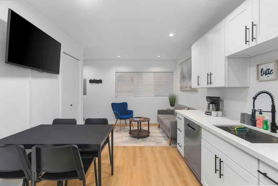 Comfort Apartment | Living area | 40-inch flat-screen TV with digital channels