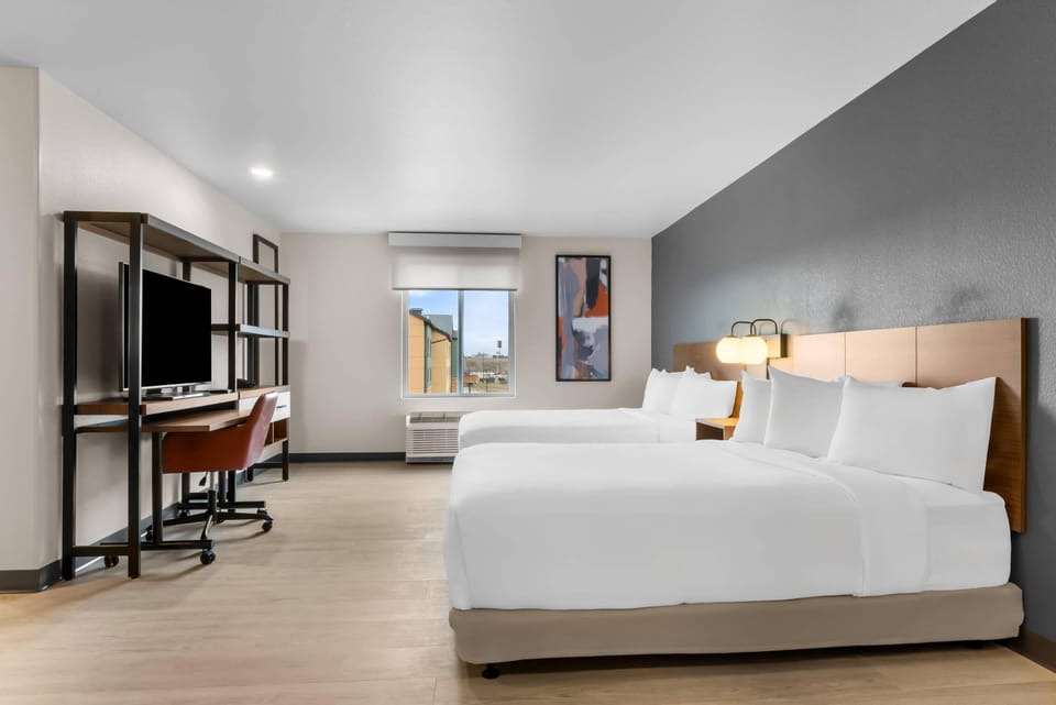 Suite, 2 Queen Beds, Non Smoking | Pillowtop beds, desk, laptop workspace, blackout drapes