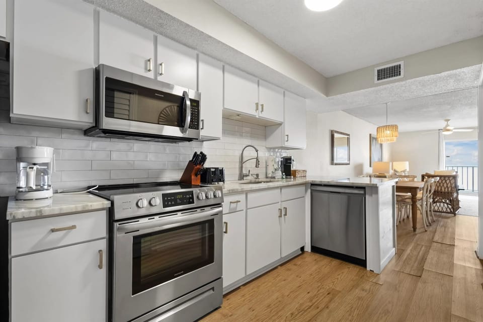 Modern updated kitchen with sleek finishes, stainless steel appliances, and all the essentials for a seamless cooking experience.