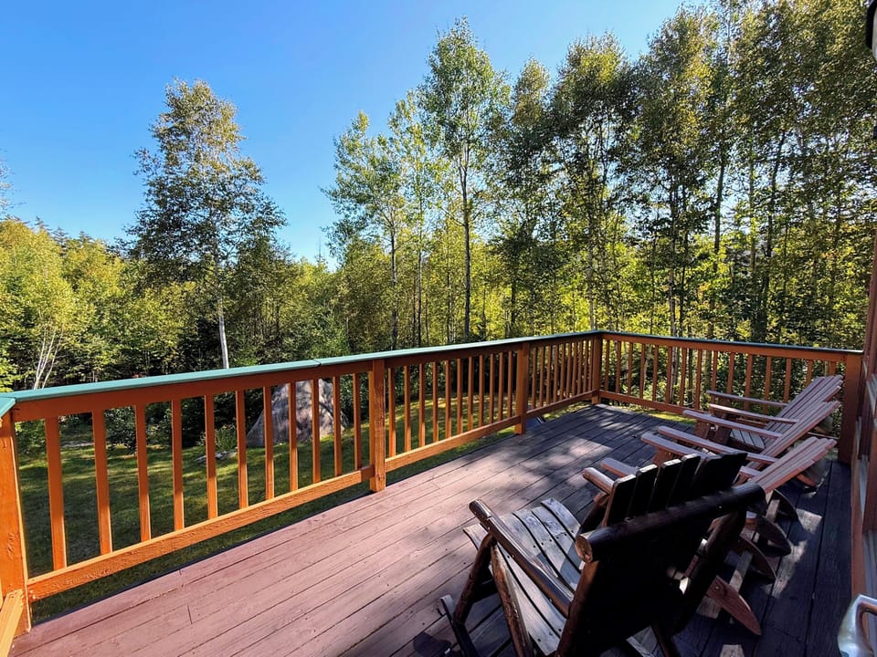 Main level deck with partial views and lots of seating
