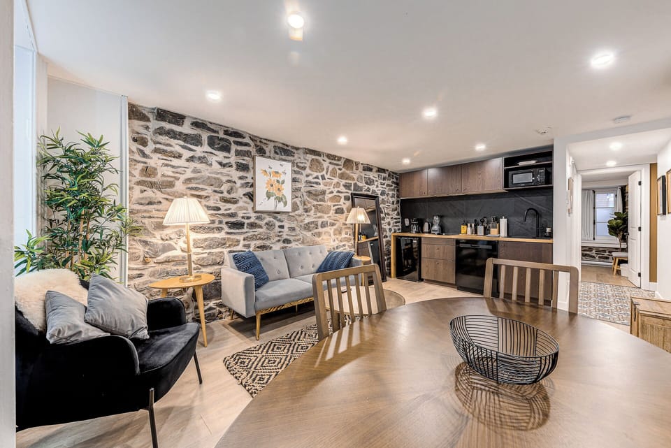 Deluxe Apartment, Patio | Living area | 55-inch flat-screen TV with cable channels, TV