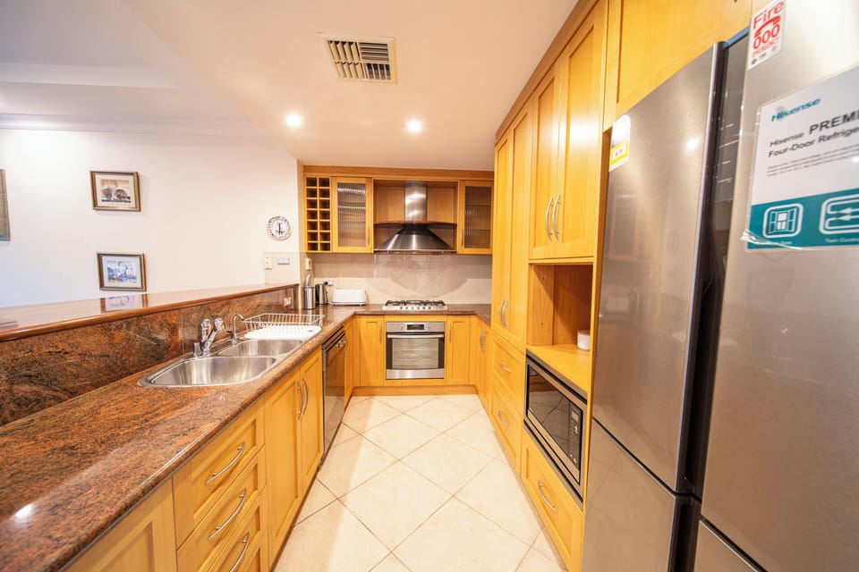 Economy Townhome, Balcony | Private kitchen | Electric kettle, toaster