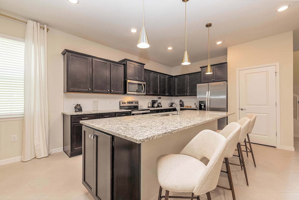 Use the breakfast bar for meals or as a work-friendly spot.
