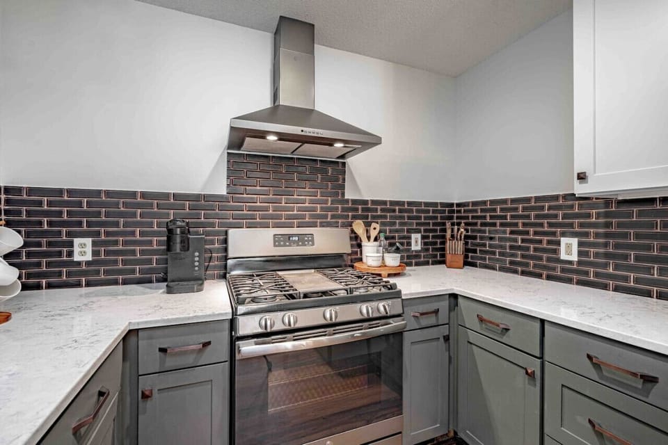 Modern kitchen with all the essentials for cooking.