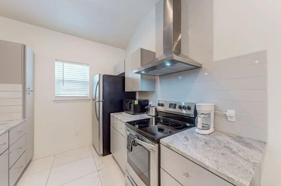 Welcome to our culinary haven! This kitchen is where delicious meals are crafted and cherished memories are made around the family table.