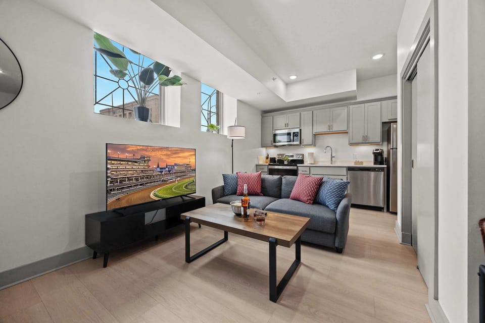 Living Room: Make yourself at home in the cozy living room with a comfy sofa and TV to unwind.