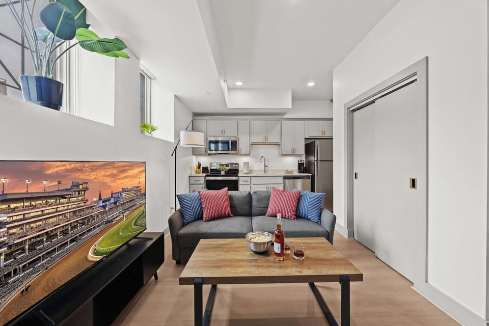 Living Room: Make yourself at home in the cozy living room with a comfy sofa and TV to unwind.