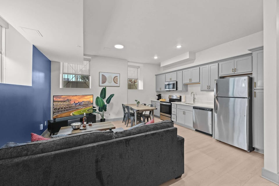 Living Room: Make yourself at home in the cozy living room with a comfy sofa and TV to unwind.