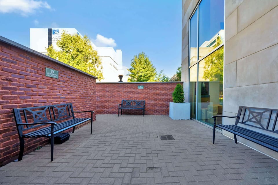 Modern touches and historical architecture come together in the courtyard offering a welcoming outdoor space.