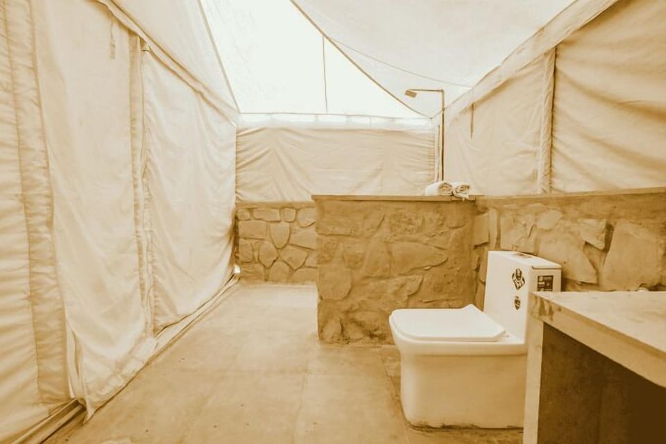 Shower, free toiletries, slippers, towels