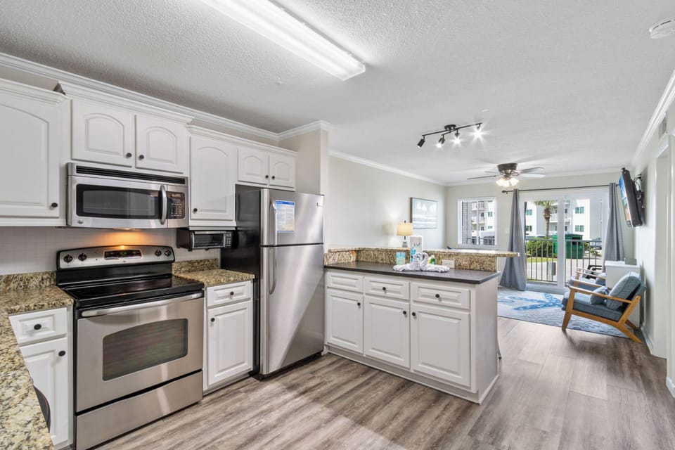 Signature Condo, 2 Bedrooms, Beach View, Beachside | Private kitchen | Coffee/tea maker, fridge, microwave, oven