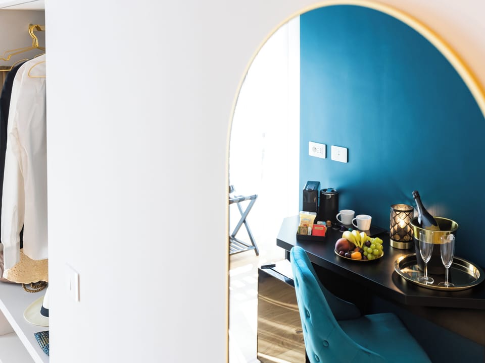 Queen Deluxe , River View | Minibar, in-room safe, desk, laptop workspace