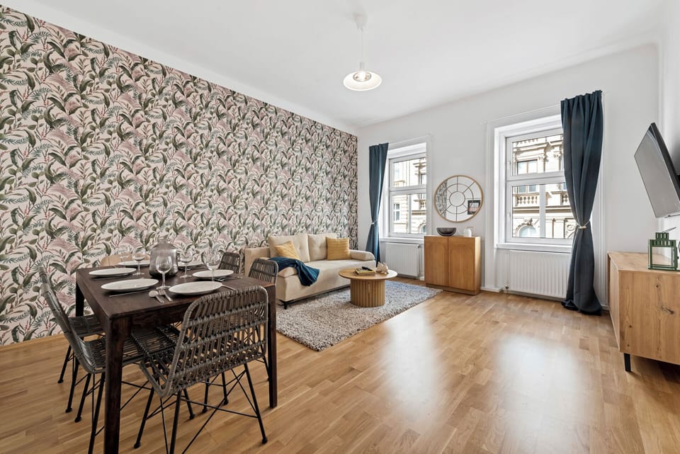 Deluxe Apartment, City View | Living area | Flat-screen TV