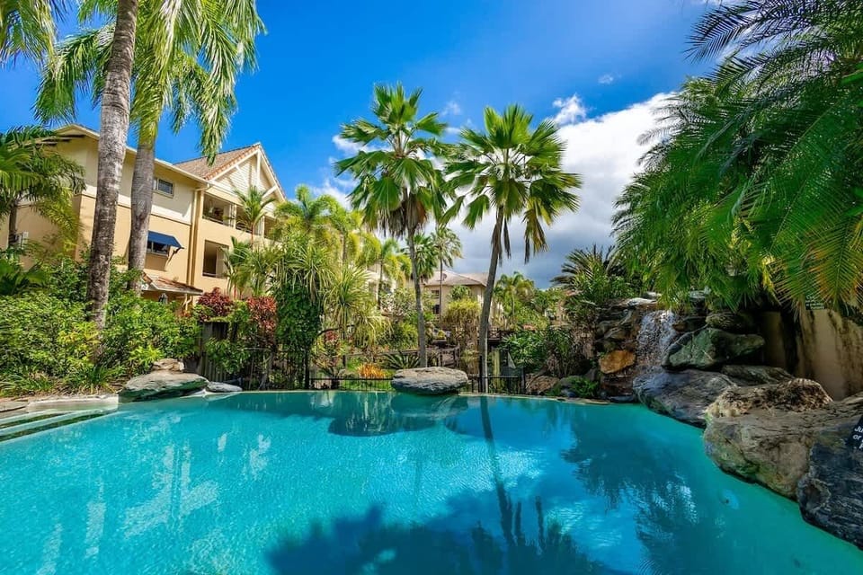 Four resort pools sit within the grounds, including a lap pool and a separate spa pool, all complimentary for guests.