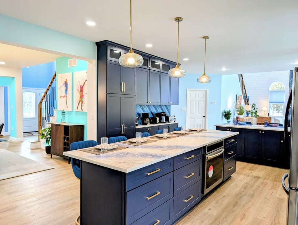 31311 May Drive, Bethany Lakes, Bethany Beach - kitchen - Expansive kitchen view showing the breakfast bar seating and integrated beverage fridge.