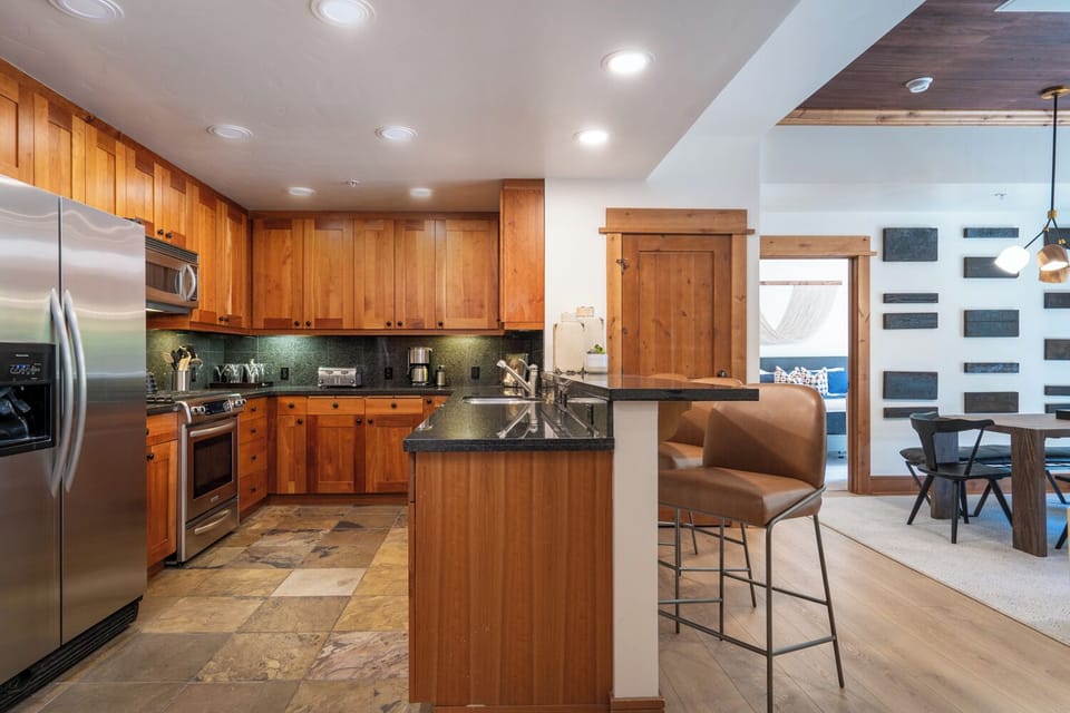 Fully equipped kitchen with gas range and stainless appliances