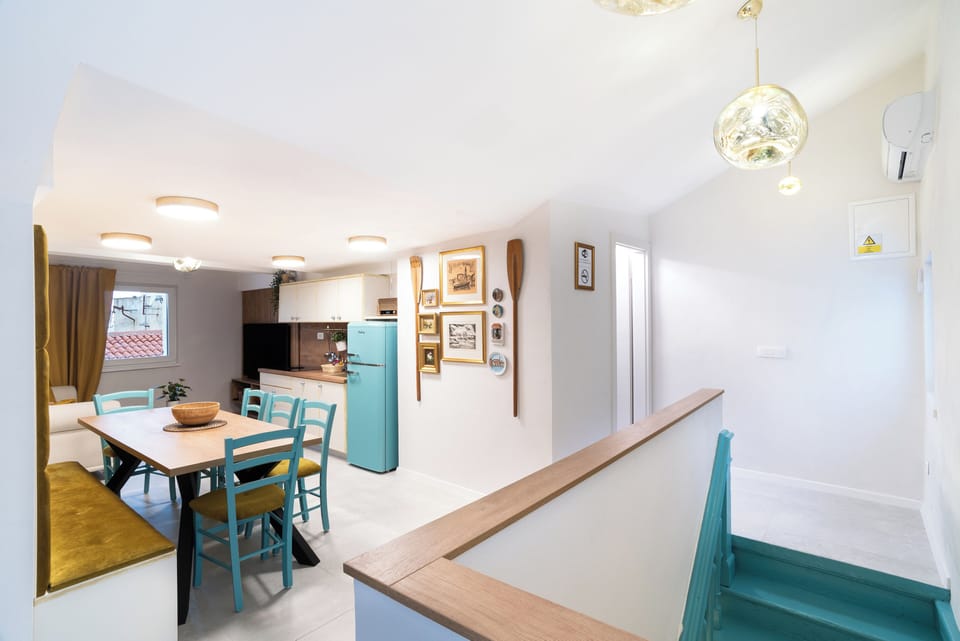 Family Apartment, 3 Bedrooms, City View | Living area | Flat-screen TV