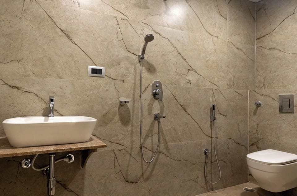 Shower, free toiletries, towels, soap