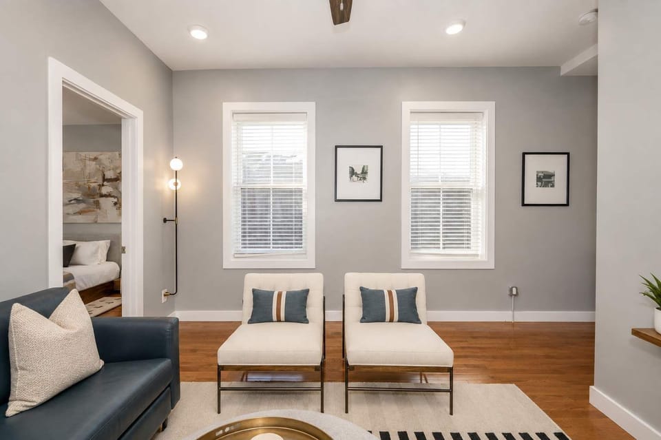 Unwind in this stylish and spacious living area, thoughtfully designed with comfortable seating, warm natural light, and modern décor.