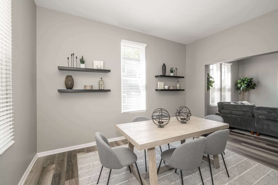 Enjoy meals together at the dining table, offering seating for 6