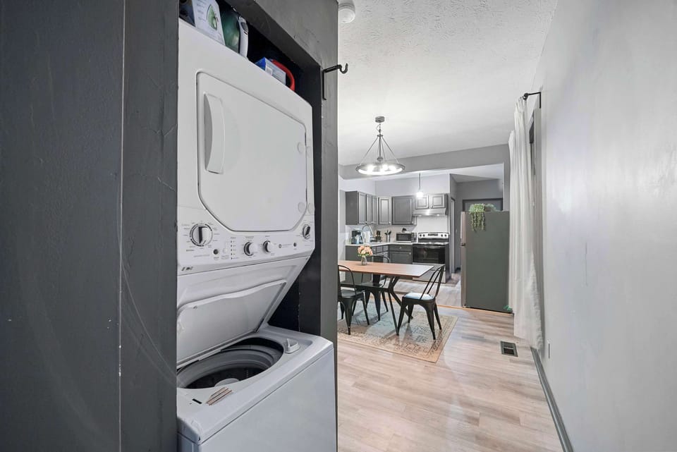 Private laundry is available for your stay, tucked away near the kitchen