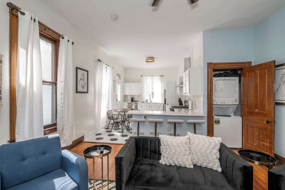 Living, dining, kitchen, and laundry area