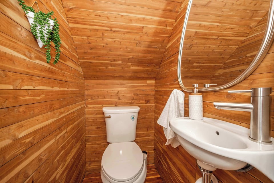 A convenient half bathroom is tucked away on the 1st floor