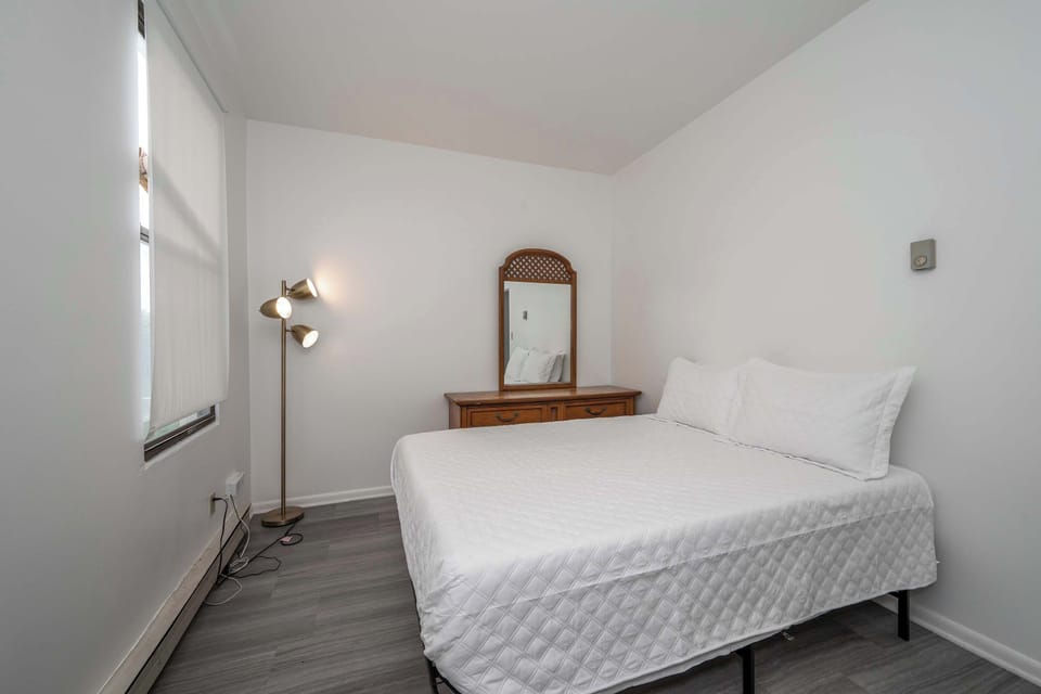 Suite 2: The bedroom retreat features a plush queen-sized bed & large dresser​