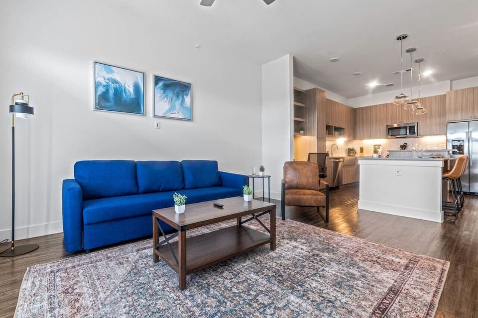 Once you enter the living room you'll find a space that feels both luxurious and cozy, perfect for unwinding after a long day.