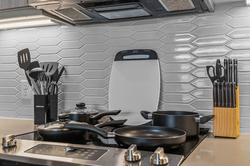The kitchen invites you to experiment with new recipes, offering a stylish and practical space to cook and create.