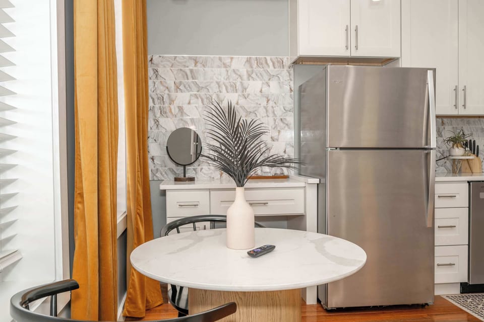 Enjoy meals together at the cozy dining table, offering seating for 2