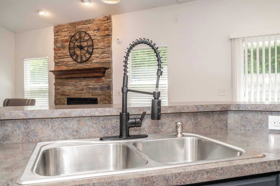 The open kitchen is spacious & fully-equipped with great amenities