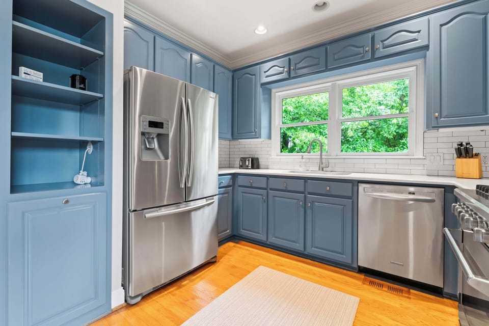 The open, airy kitchen offers ample space & all the comforts of home